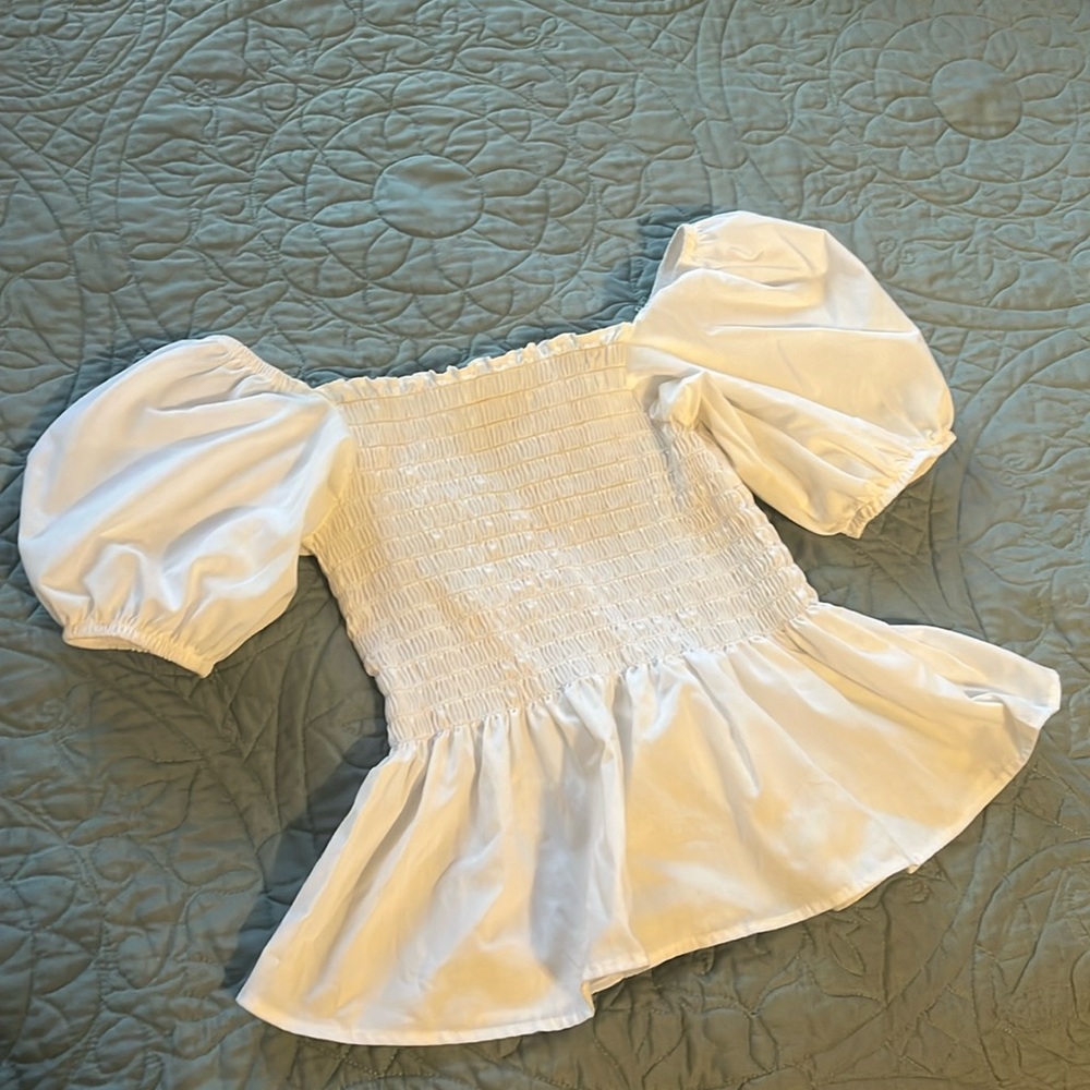 White puff sleeve medium top with smocked bodice